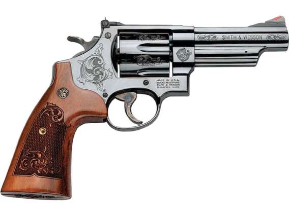 "Embrace power and elegance with the Smith & Wesson Model 29 Revolver. Chambered in 44 Remington Magnum, 4" barrel, 6-round capacity. Engraved blued finish and wood grips for a timeless touch."