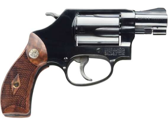 "Embrace timeless craftsmanship with the Smith & Wesson Model 36 Classic Revolver. Chambered in 38 Special +P, featuring a 1.875" barrel, 5-round capacity, blued finish, and elegant wood grips."